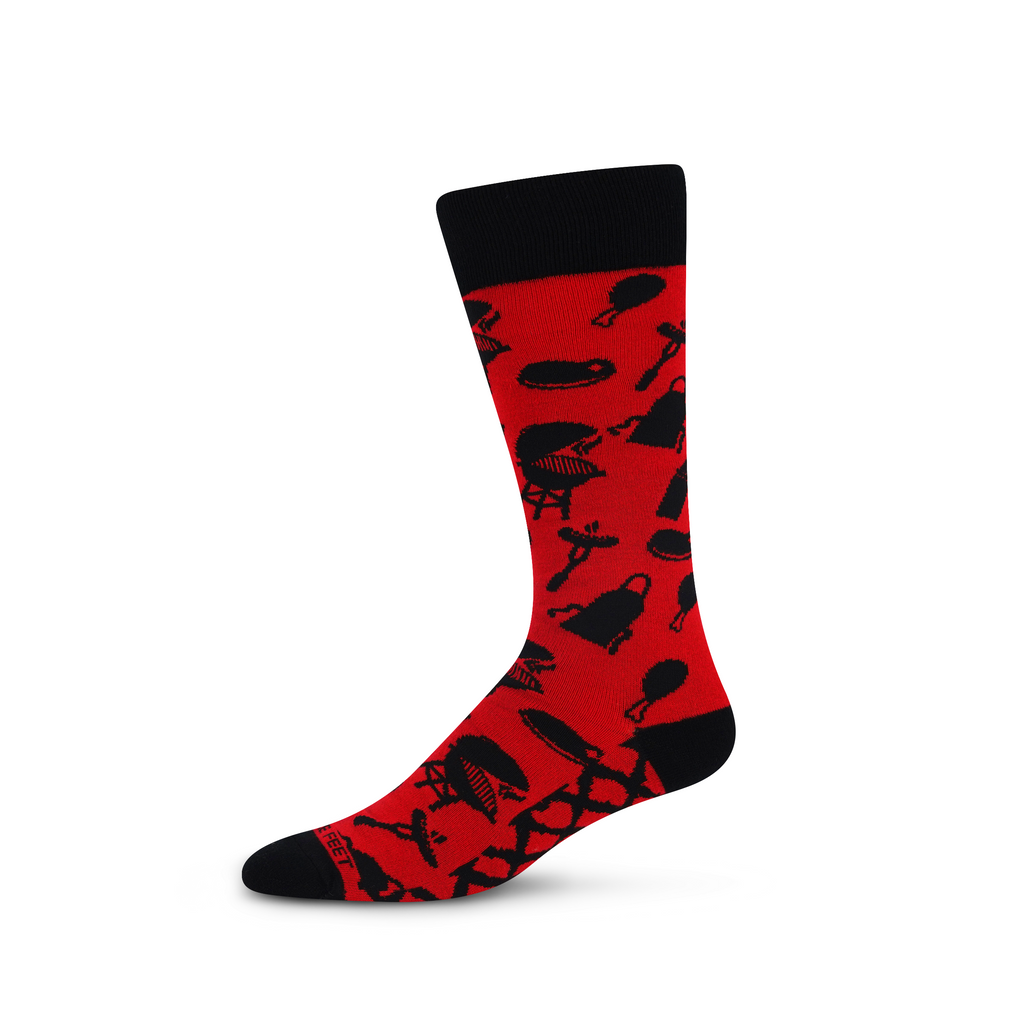 FBF Grilling Sock is made with background of Red. The Graphics, Cuffs, Heels and Toes are Black. Graphics are all about Grilling outdoors. Kettle Grills, Long Forks,