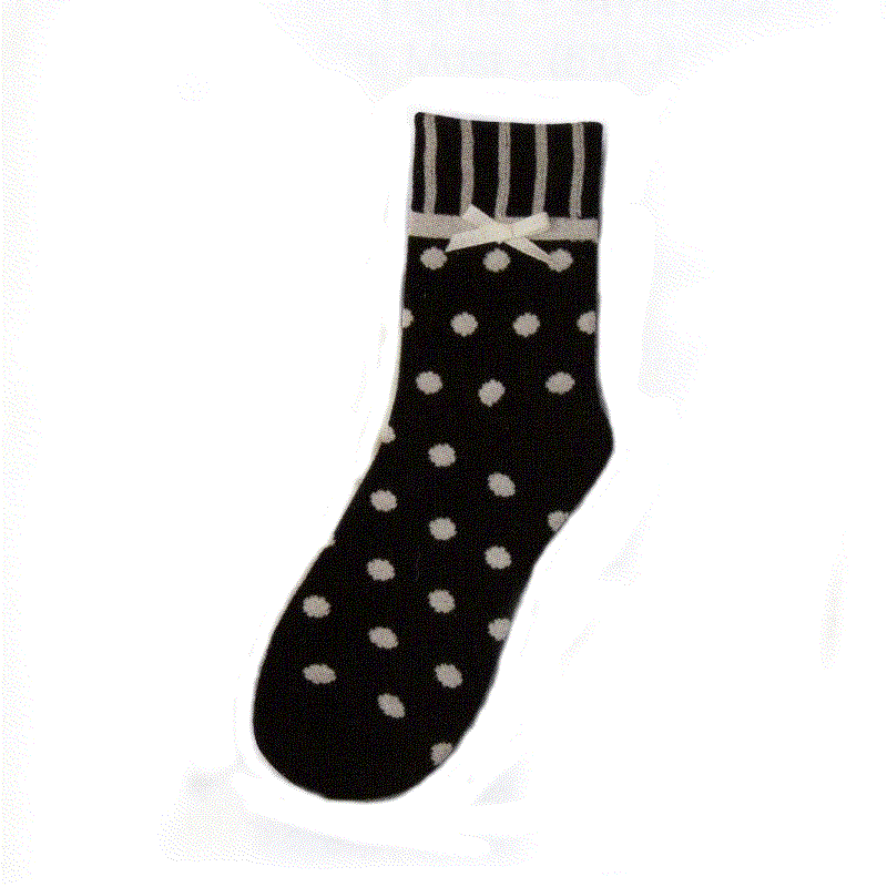 Black and Ivory Stripes at the Cuff with a Ivory Bow Tie. Then Polka Dots run all the way down to the Toe. The Heel and Toes are Black.