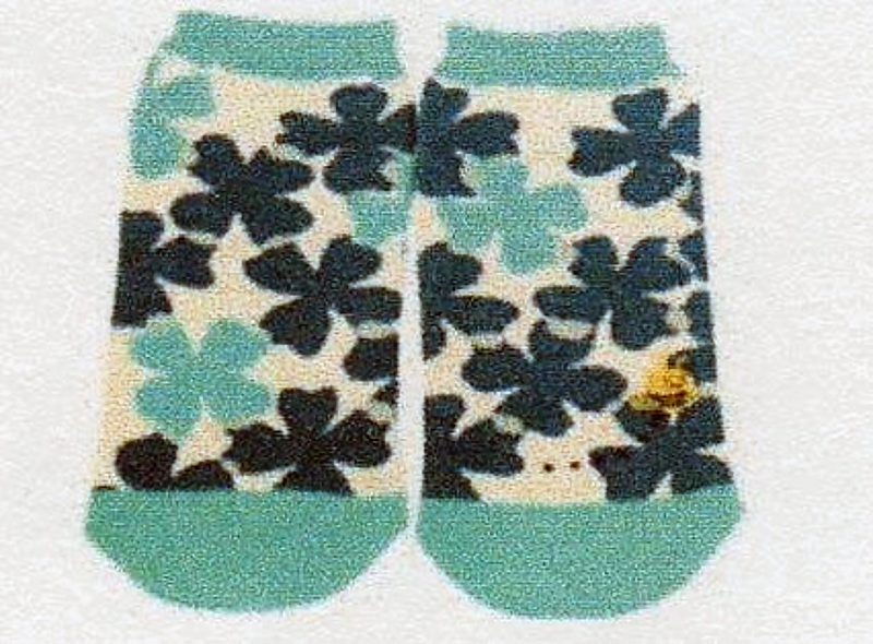 Just a Little Mismatched one with a Bee and one Clover Sock without.