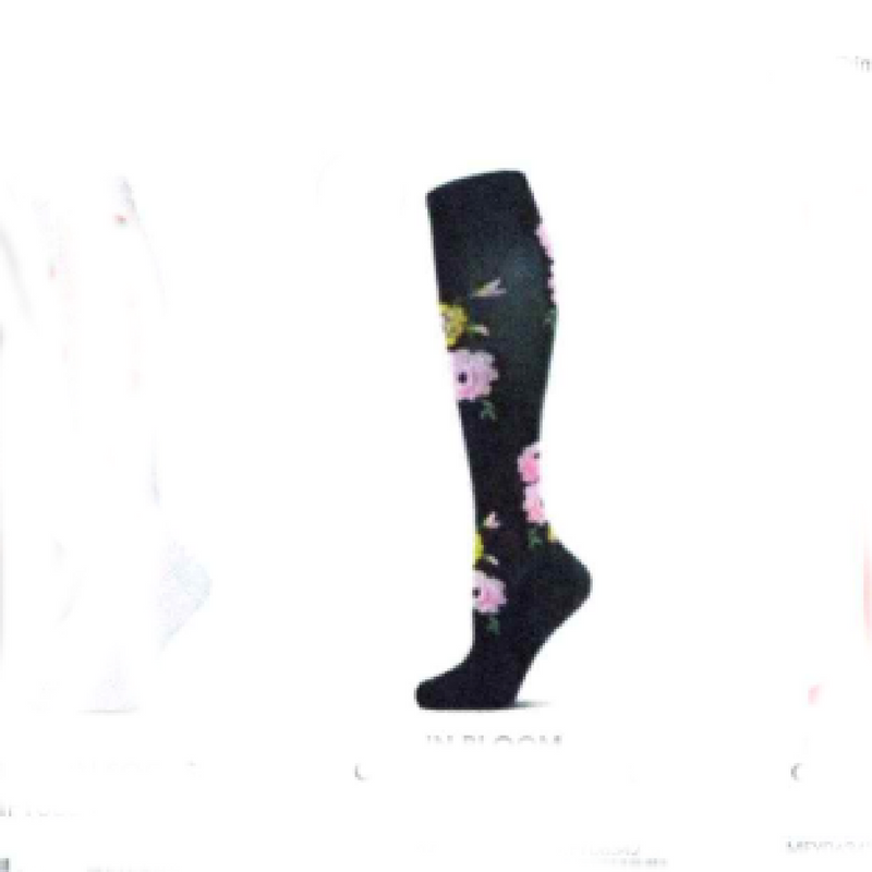 Black knee-high sock with floral design on a white background