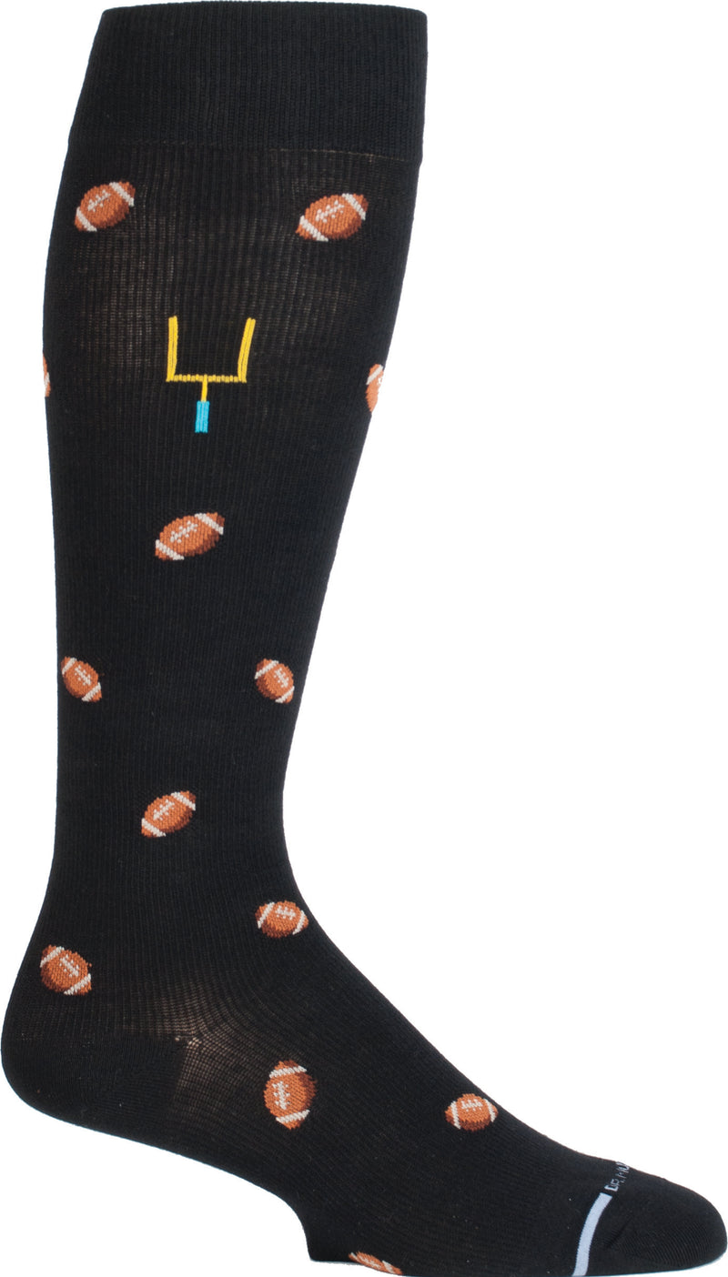 On a Black Sock are Footballs of Brown and White.  The Footballs surround the Goal Posts on each side of the leg in Blue and Yellow.