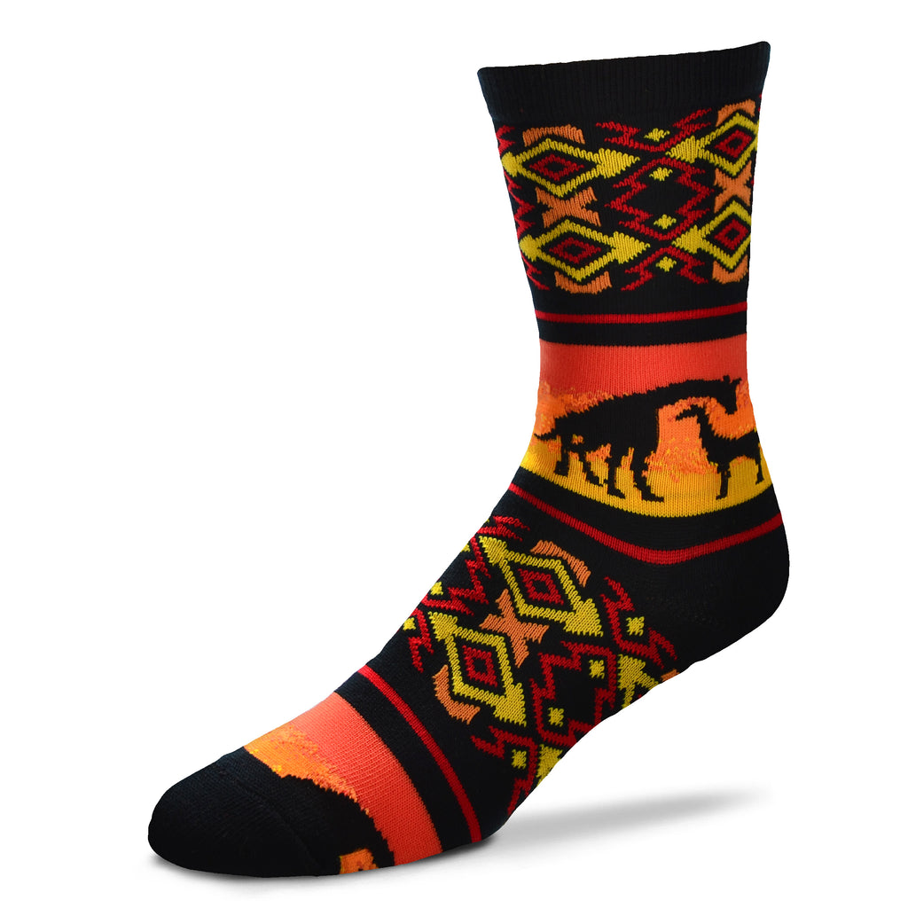 FBF African Giraffe Sock is on Black The Sock is given an African Blanket Design in Yellow, Orange and Red. Above the Heel is the African Adult Giraffe and her Calf in Silhouette with a Sunset on the African Plains
