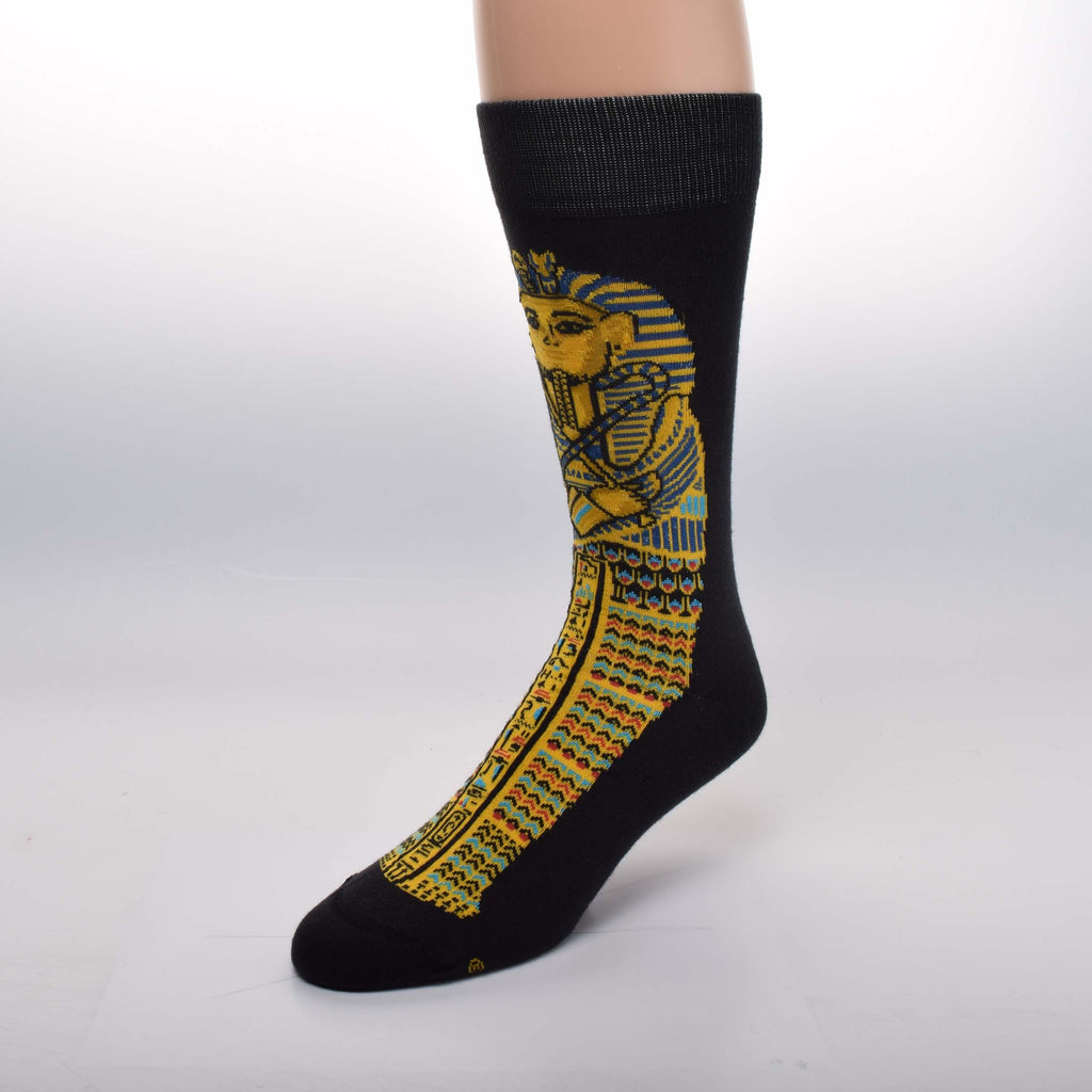 For Bare Feet Egyptian Tut Sock starts on a background of Black. This makes the Gold Tut Coffinette pop off the cloth to show how magnificent it is. Gold, Blue, Turquoise and Red Orange and just the most brilliant.