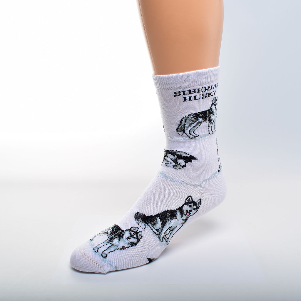 The Siberian Husky Poses 2 Sock from FBF is on a background of Bright White. At the Top reads, Siberian Husky. Then the Poses of this Dog begin in White, Black, Dark and Light Greys.