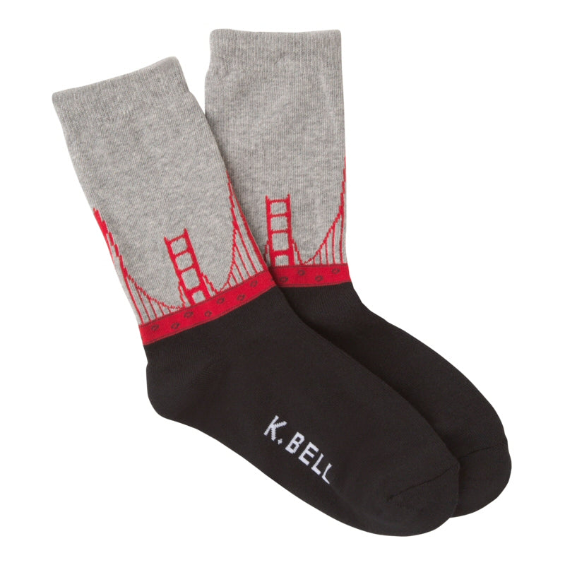 K Bell American Made Womens Golden Gate Bridge Sock starts with the Top of Grey. Fog is a usual sight over the Golden Gate Bridge so Grey suits the sock. The Bridge is Red in this. It is really a color all to itself, Golden Gate Orange. The bottom of the Sock is the water and it is Black. Late at night, that is the color. 