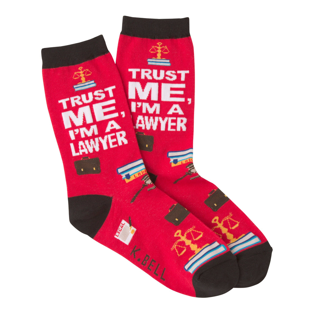 The Scales of Justice are doing Just fine with K Bell I'm A Lawyer Sock. It starts on a Red background with Black Cuffs, Heels and Toes. Under the Cuff is the Scales on Top of Law Books. These rest on the words in White Bold Letters, "Trust ME, I'm A Lawyer" Under this are briefcases, maybe filled with briefs! More Law Books, Legal Documents and a Gavel and Block.