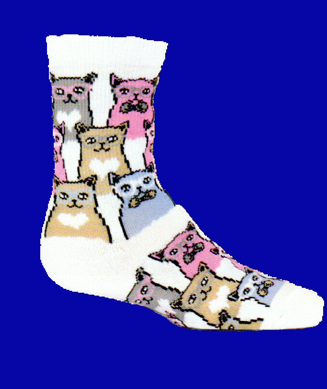 K Bell Kids Smarty Cats Sock is on a Bright White background. The Cats are Grey, Pink, Wood Brown, and Light Blue. They are all Smart Cats wearing Glasses! Some are wearing Bowties and those without have a patch with a Heart on their Chests. All of these Smart Cats look Happy!