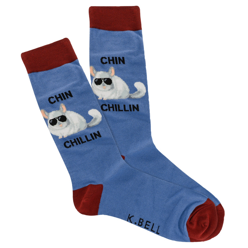 K Bell Mens Chin Chillin Sock starts on a Dark Blue background. The Cuffs, Toes and Heels are Burgundy. On the Ankle on Both Sides is the Chinchilla in Light, Medium and Dark Grey. His Ears Tongue and Nails are Pink. He is wearing Black Sun Glasses. The words in Bold Black Letters read, "CHIN CHILLIN".