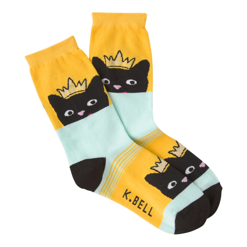 K Bell Cats Peek Sock is a Black Cat on a Yellow and Tea Green background. She is the Queen of Peek-a-Boo. She has a Gold Lurex Crown to Prove It.