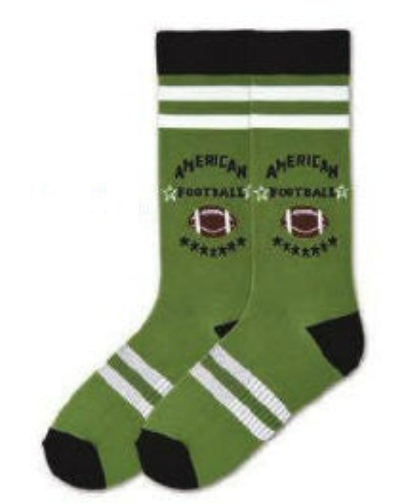 K Bell American Made Mens American Football Sock starts out with an Olive background with Black Cuffs, Toes and Heels. With White Rugby Stripes at the Top and Bottom. "American Football" is in the middle of White Stars made in Bold Black Print. Beneath is a Brown and White Football and Black Stars.