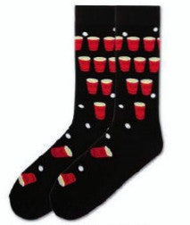 K Bell Beer Pong Socks for Men come in Large and X-Large Size. Start off on a Black background with Red Cups full of Amber Beer. The Cups are lined up for throwing the White Pong Balls into them. Some at the top of the foot and near the toes have fallen over.