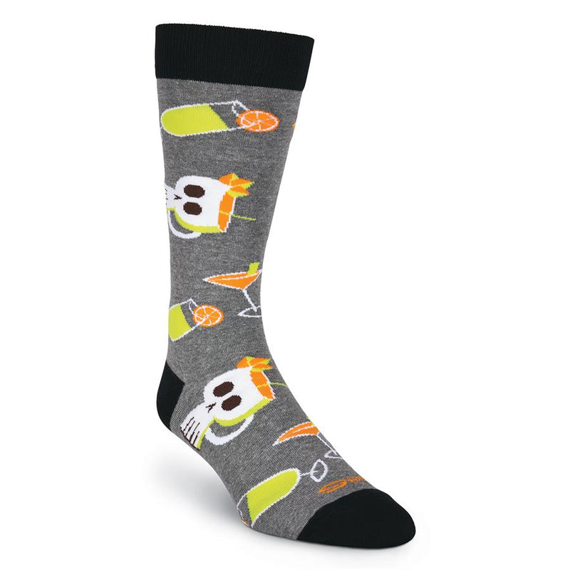 K Bell Mens Shag Drinks Sock starts off with Charcoal Heather background and Black Cuffs, Heels and Toes. Then comes the Tiki Style Fun Drinks in Bright Oranges and Limes. They are in Highball Glasses with Stems and Martini Glasses. The biggest one is the Skull Ceramic Cup that you can most likely buy and take home.