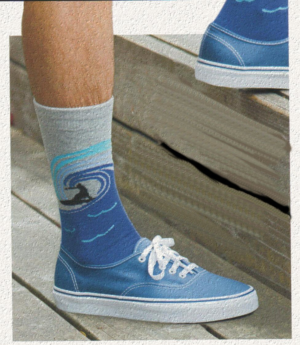 Model wearing K Bell Mens American Made Surf's Up Novelty Sock. Looks great with Blue Tennis Shoes.