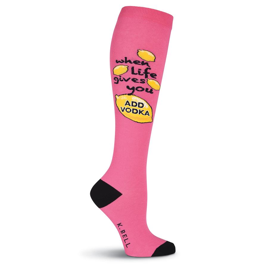 K Bell Life and Lemons Knee High is on a background of Pink and the Heels and Toes are Black. The Words in Black Read "When life gives you....Add Vodka" Around the words are Yellow Lemons.