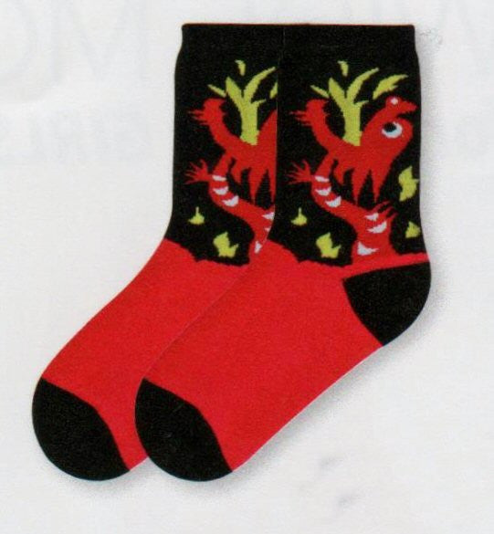 K Bell Kids Dragon Sock starts with Black background Heels and Toes. The Dragon is Crimson Red with Dark Khaki Flames coming from his Maroon Mouth. Black and White make his Eyes.