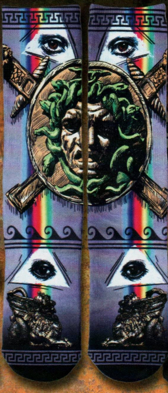 Kurb Medusa Sock lying flat showing front of sock with Medusa Head in shield and Eyes with Rainbow