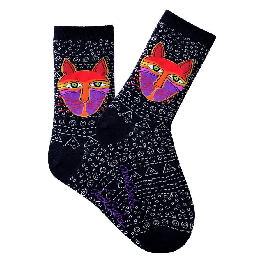 Laurel Burch Native Cats start on a Black background with Sliver thread making Lines, Diamonds and Triangles from top to bottom. The Native Cat is a Brightly Colored Face Mask of Purples, Burnt Orange and Lime with other colors too.