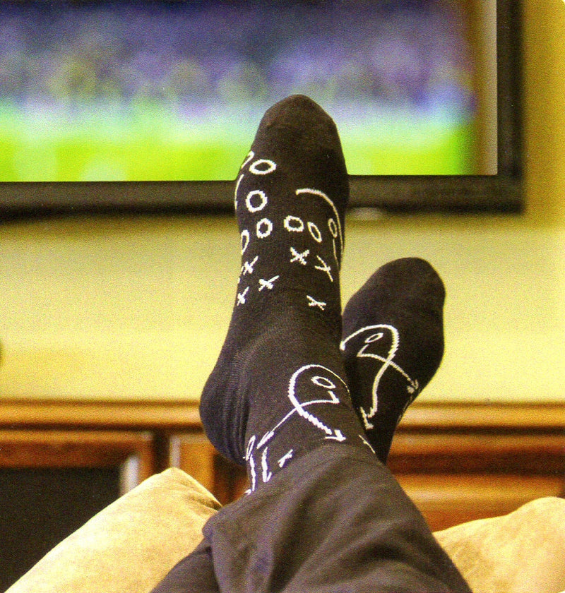 Model wearing Game Plan while watching Football on TV.