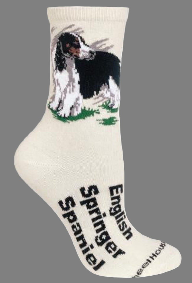 Wheel House Designs English Springer Spaniel Sock on a Natural background for this designer group. It has the Name of the English Springer Spaniel on the foot and a picture of the Dog on the Ankle Cuff.