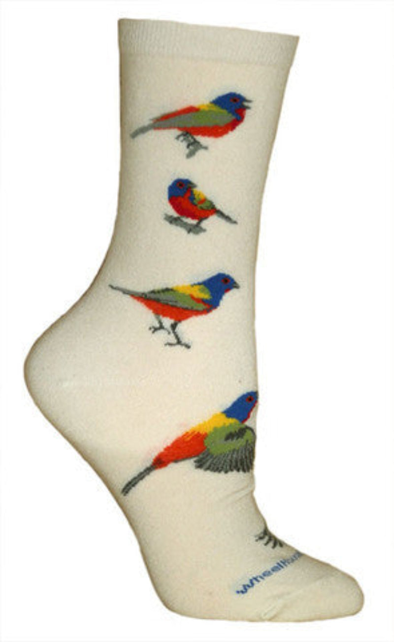 Wheel House Designs Painted Bunting starts on a Natural Cream background with the Painted Buntings in Blues, Reds, Greens and Yellows all over.