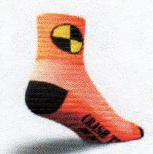 This Sock is Called Crash Test Dummy. The Yellow and Black Round Circle symbol is for Crash Test Dummies. It is on a Bright Orange Cuff. The breathable mesh is next in Orange and White. The Heels and Toes are Black. The Orange instep reads, Crash Test Dummy!