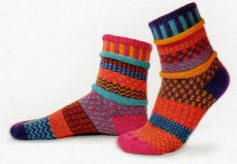 Solmate Socks Vermont Garden Carnation Sock is a Mismatched fun print design of geometric whimsy. The Colors are Fuchsia, Turquoise, Purple, Yellow and Orange.