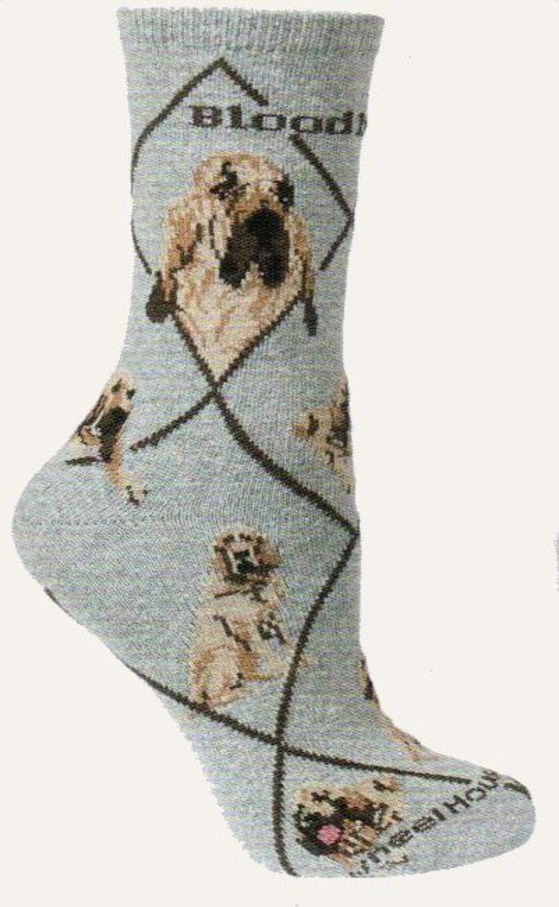 The Word Bloodhound and the Diamond Lines are in Liver Color. The background of the Sock is Grey. The Bloodhound Profiles show the Light Tan and Light Brown with the Black Muzzle. The Poses are of the Bloodhound laying down on his side and front also standing and sitting.