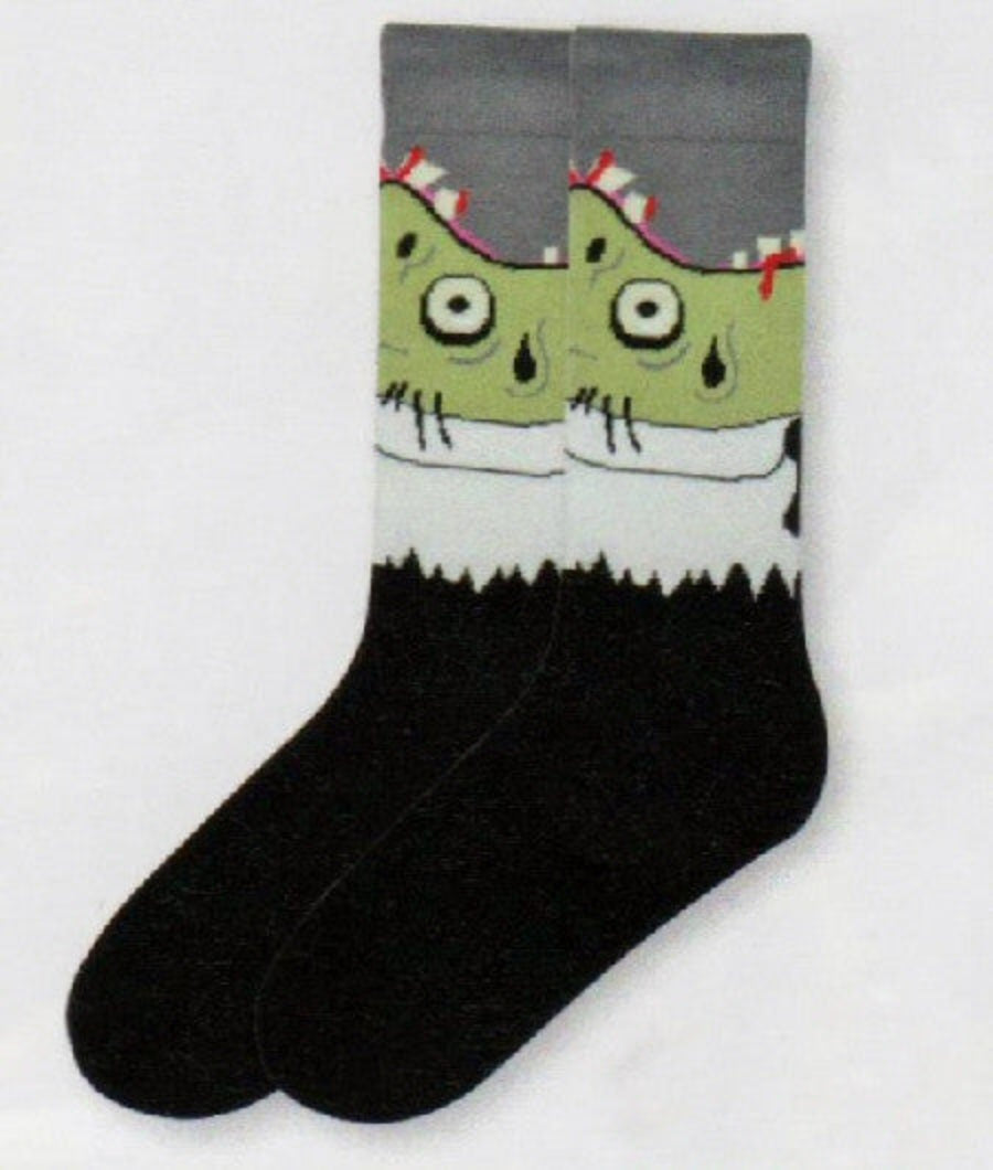 K Bell Mens Zombie Socks is a Guy wearing a Black Suit and White Shirt with a Red Tie. The only problem is he is Green and Bleeding.