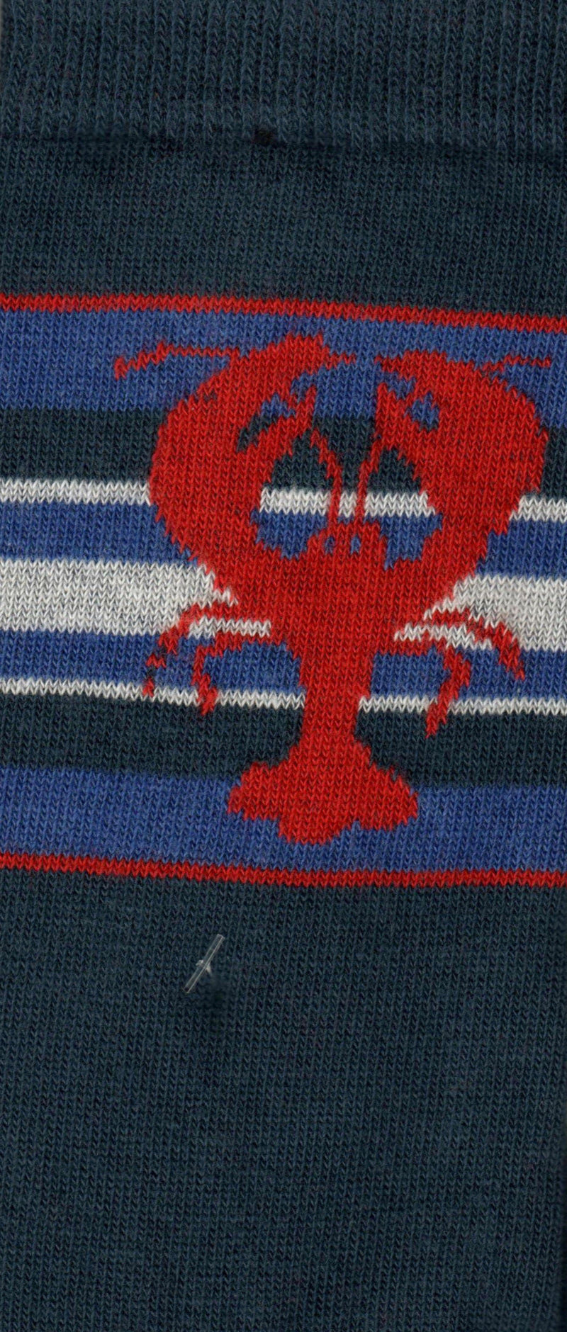 This is a Scan of the Lobster Sock showing the real white, blues and red