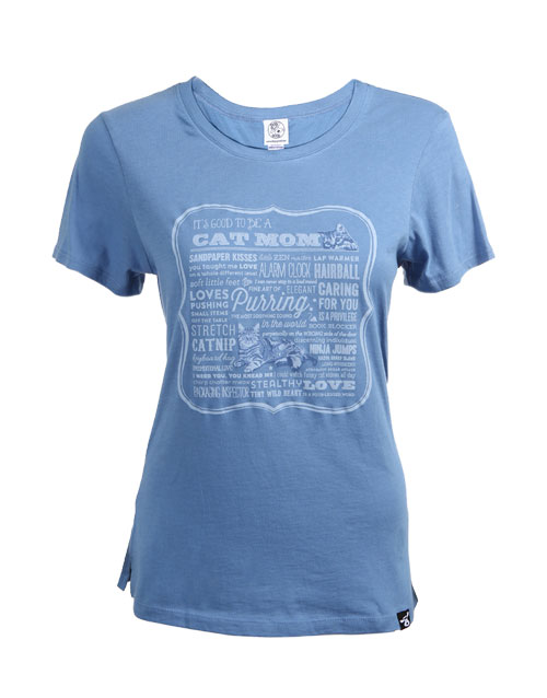 Cat Mom in Blue Scooped Neck Line with a Picture of a Cat in the Middle of the Shirt and on the Top Left side is a Facial of a Cat.. All over are sayings about Cats.