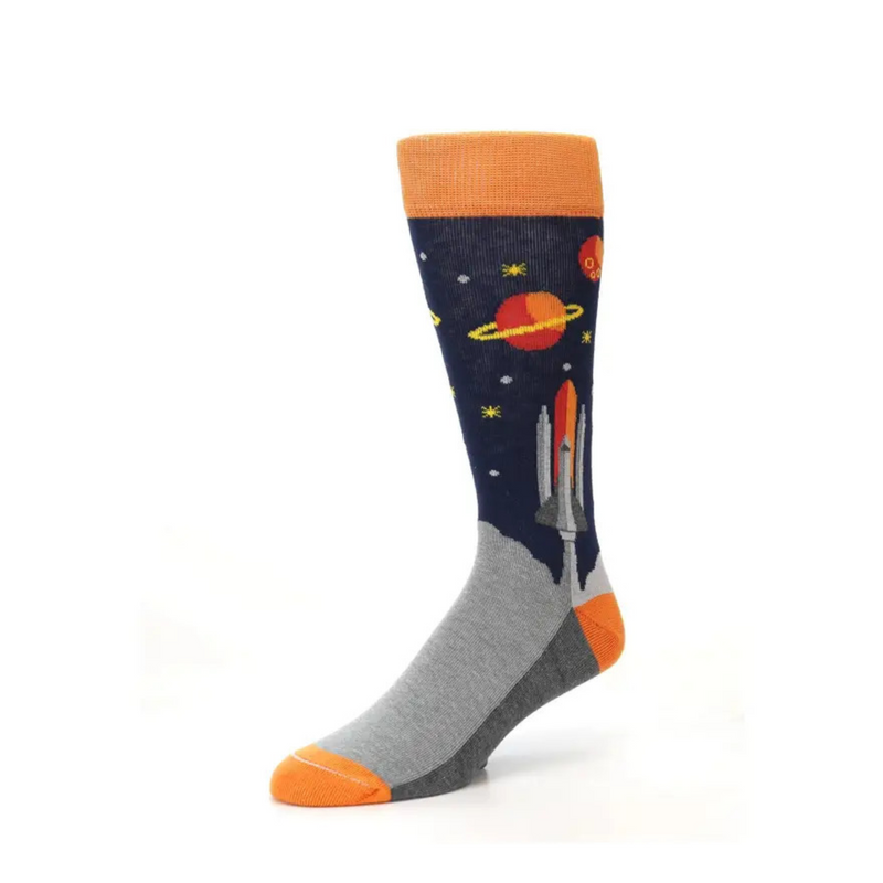 Blue Orange Spaceship Socks for Men are showing the Ship lifting off the planet. It goes into a Dark Blue space showing Planets and Stars.