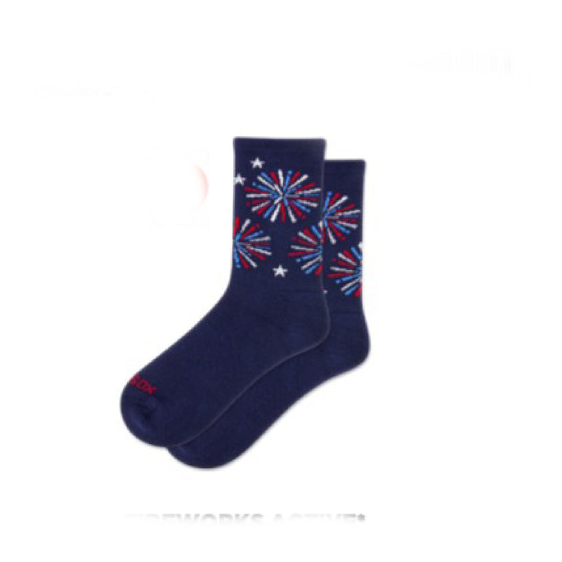 Navy blue socks with red and blue fireworks and stars design on a white background