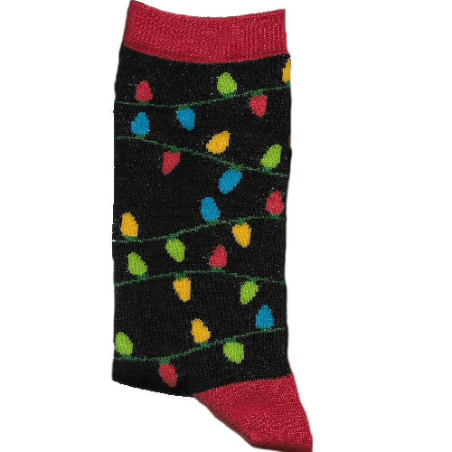 Socktastic I'm Lit Sock has a Black background with Rose Red Cuffs, Heels, and Toes. Christmas Lights are Rose Red, Pistachio. Celestial Blue and Goldenrod. The string is Hunter Green. The Bottom of Sock says I'M LIT.