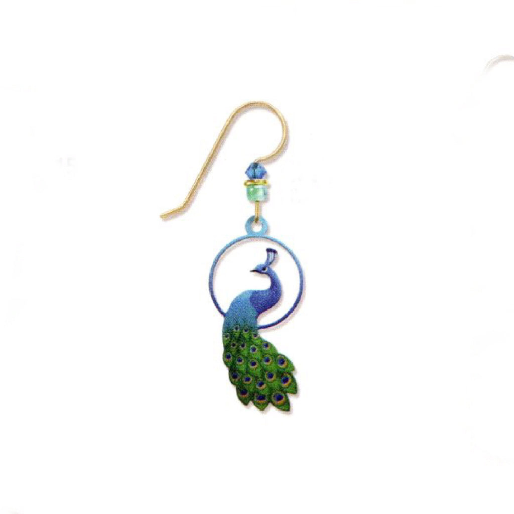 Earring with peacock design on a white background