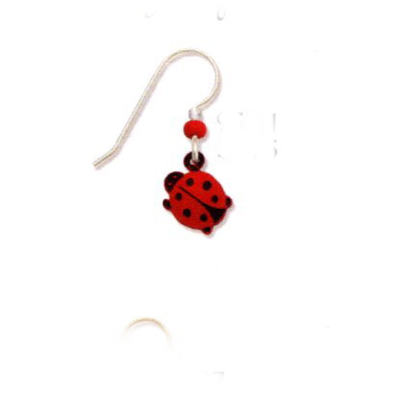 Red and black ladybug-shaped earring on a white background