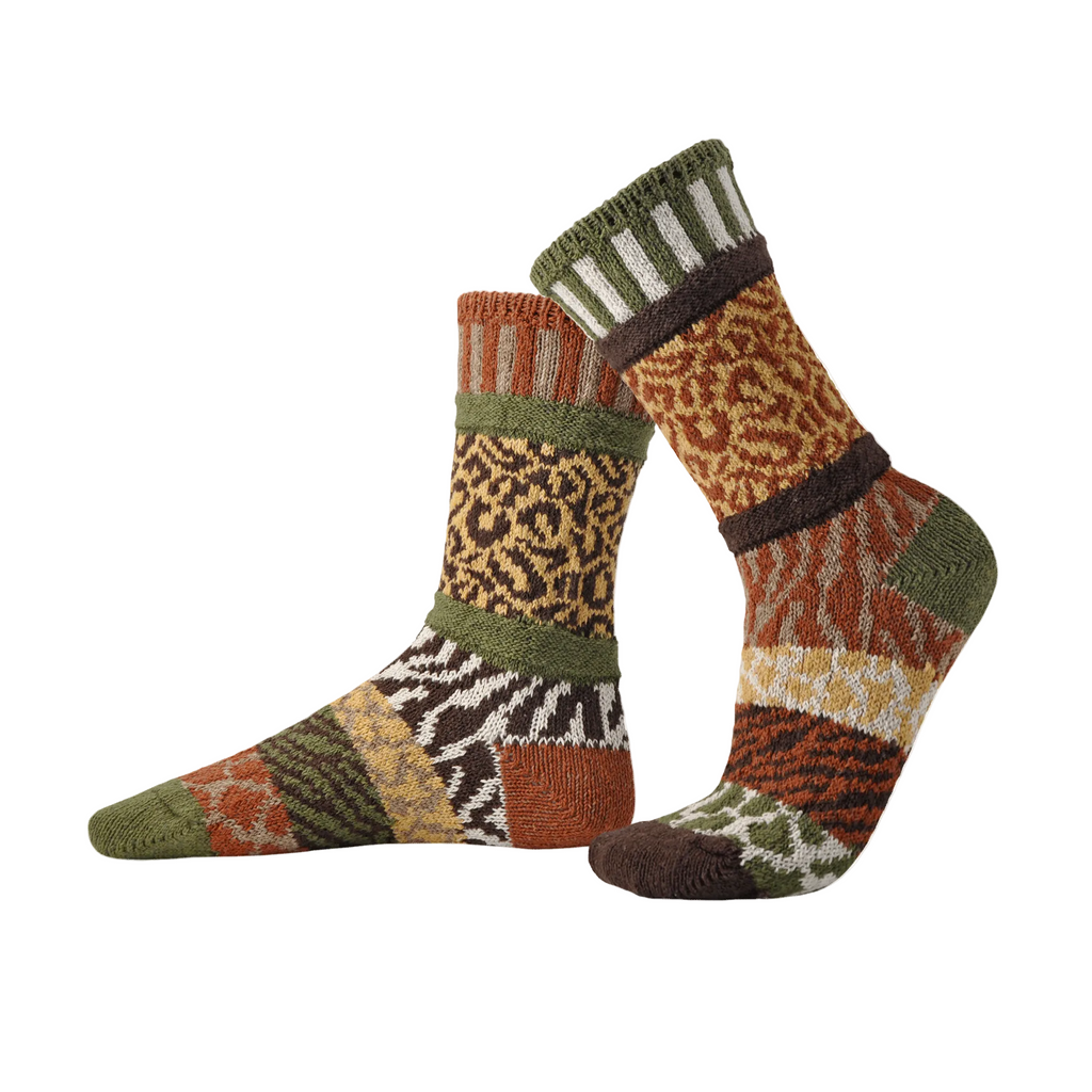 Pair of Savanna Animal patterned socks on a white background