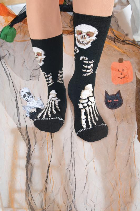 Wheel House Designs Skeleton Sock on a Model shows how fun it is to wear this pair of socks