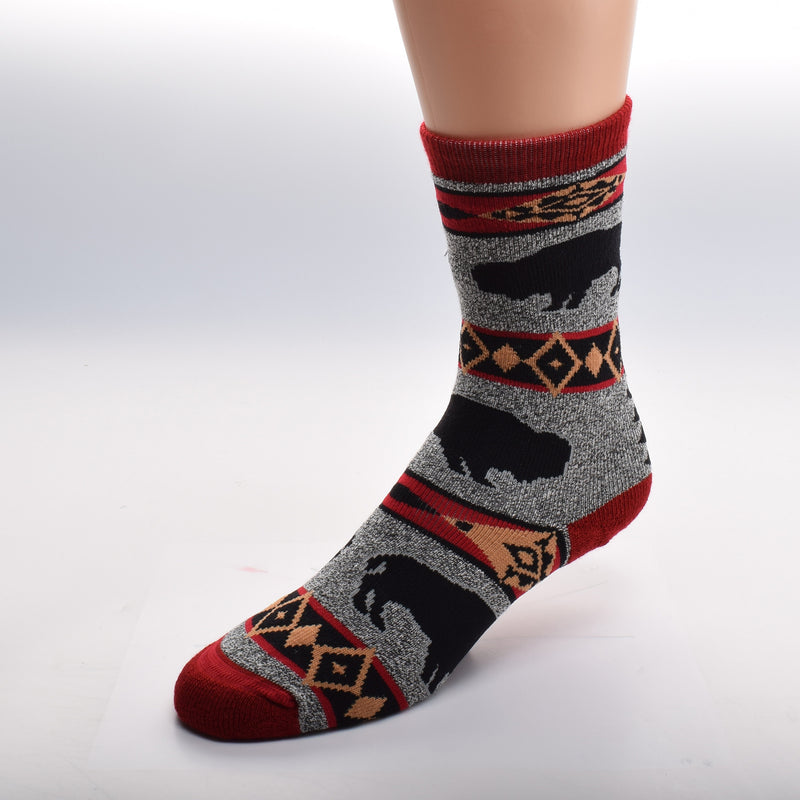 For Bare Feet Buffalo Blanket Motif Sock comes in Sizes Medium and Large. The background is a Heather Grey. The Cuffs, Heels and Toes are Maroon. The breaks are designed in American Tribal Motif of Red, Black and Gold. The Buffalo are Black Silhouettes.