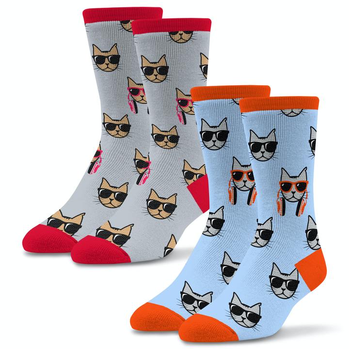 Socktastic Mens 2 Pair Pack Cool Cats Socks come in two colors. The first is designed with a Ruddy Blue background and Chili Red Cuffs, Heels and Toes, along with the outline of Sunglasses of Cool Cat in the Middle of the Sock. The Cool Cat is in Grey all over the Sock. The 2nd Pair is a Light Umber Grey with Madder Red Cuffs, Heels and Toes, The Cool Cats Sun Glasses are outlined in this Color. 