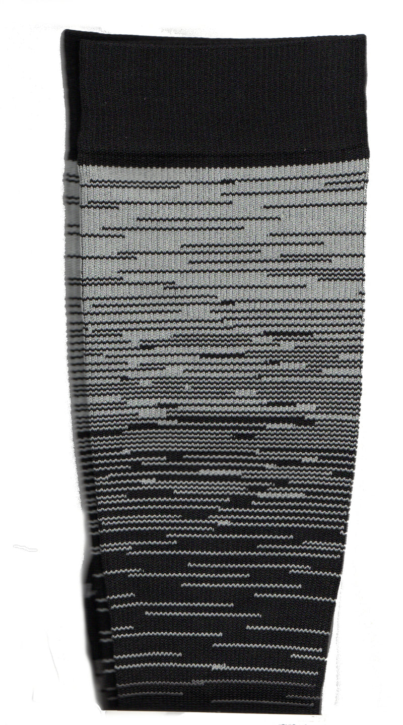 This Compression Sock has shades of stripes in Black and Grey. The Greys move through the Black in Light, Medium and Dark Shades. The Cuffs, Heels and Toes are Black.