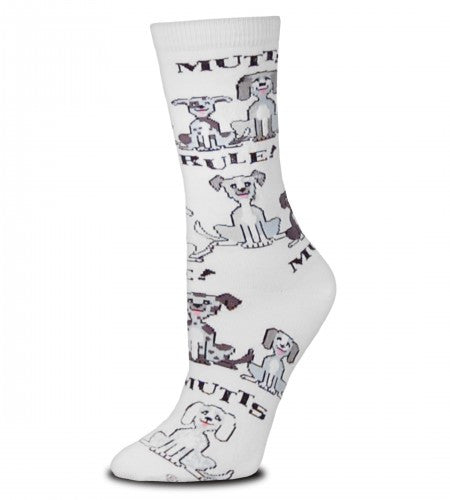 FBF Mutts Rule Sock starts on a White background with the words Mutts Rule at the top and then all over the Sock. The dogs on this Sock are Black and White, Grey and White, Brown and White and have patches, masks too.