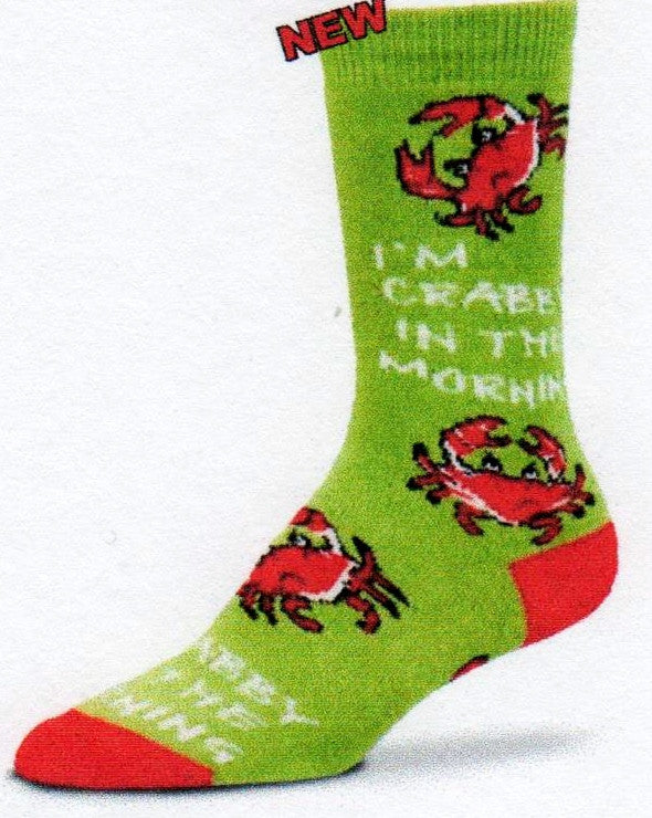 On an Avocado background FBF designed Crabby Morning with Red, Black and White Crabs saying all over the Sock "I'm Crabby In The Morning".