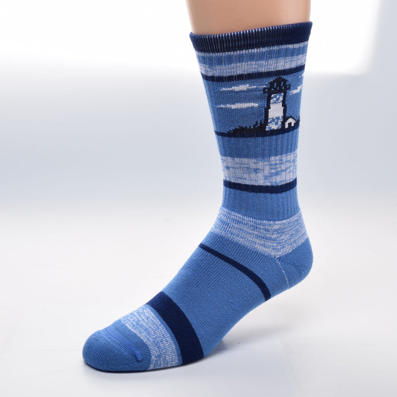 For Bare Feet Lighthouse RMC Stripe Sock is made on a background of Blue. Navy Blue Stripes some are large or narrow. The RMC (random mixed color) stripe is one made with Blue and White in random order. The Lighthouse is mostly White with a little Blue on top and bottom. The Top of the the Lighthouse and the outlining of it and the Lightkeepers House is Navy. The Clouds and the House are White.