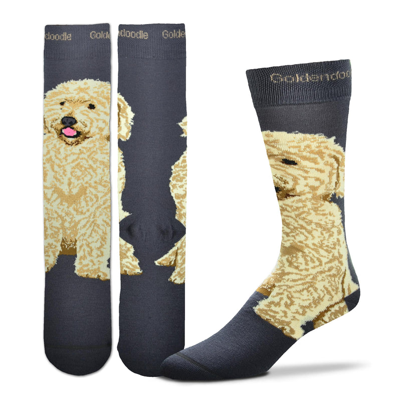FBF Realistic Goldendoodle Sock starts on a Charcoal background. In the middle of the 2 inch Cuff is the word Goldendoodle in Buff. The Goldendoodle sits on Top of your Foot and around to your Heel. His coat is Flax and Buff with Russet for shadow and outline. Black for Eyes Nose and Mouth. One Tone Rose for Tongue.