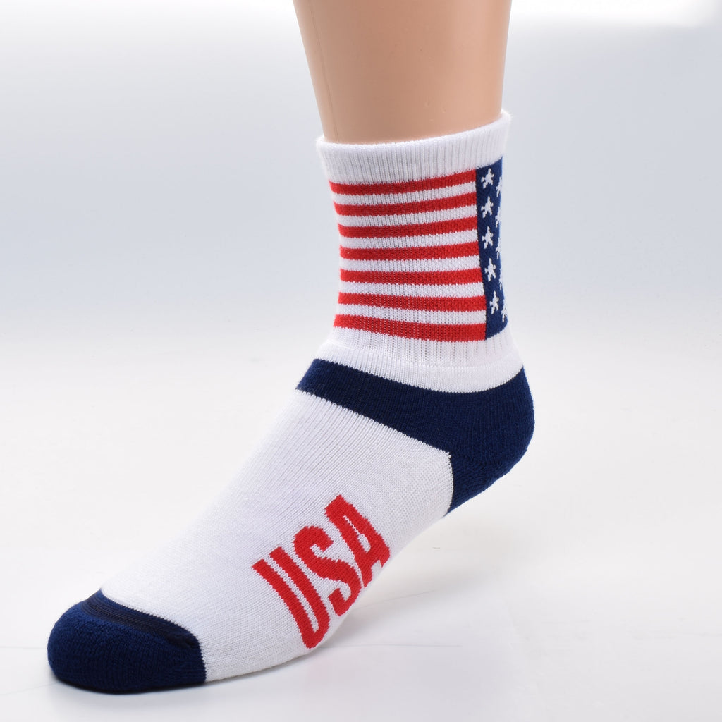For Bare Feet USA Flag Cuff Sock starts with the American Flag directly woven into the Cuff. 13 Red and White Stripes then a Canton of Navy Blue with 5 point White Stars in rows to make 50. Under the Cuff the Heel is Navy Blue. The Foot is Bright White with a Bright Red USA on both side of the foot. The Toes are Navy Blue.
