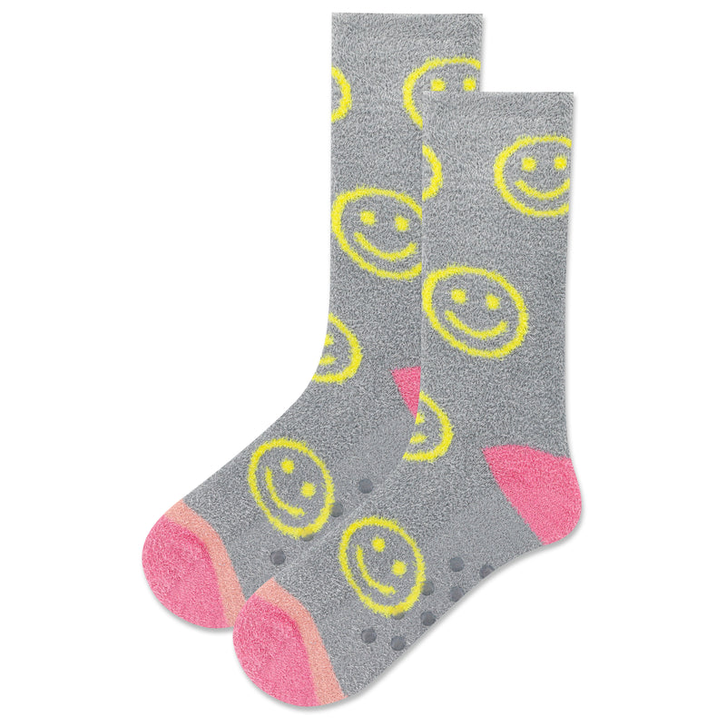 Hot Sox Womens Smiley Non-Skid Slipper Socks start on a Grey Background with Rose Pink Heels and Toes are Melon and Rose Pink. The Smiley Faces are Lemon. They move down in Rows from Top to Bottom.