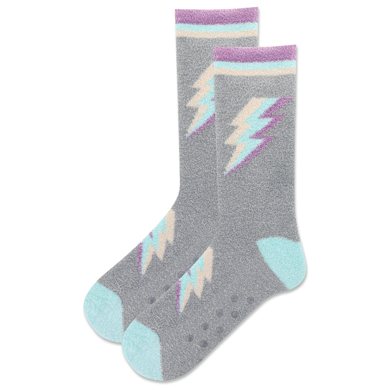 Hot Sox Womens Bolt Non-Skid Slipper Sock is on Grey background with an Electric Bolt flashing down the Front in Lavender, Teal and Cream. With Non-Skid bottoms.