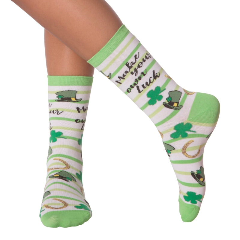 K Bell Make Luck Sock is really about what is in Bold Black Cursive Letters, "Make Your Own Luck".  The Sock on Bright White with Bright Greens Yellows Gold and Black make a simple wish for fun and happiness! It just happens to be worn by a Model! 