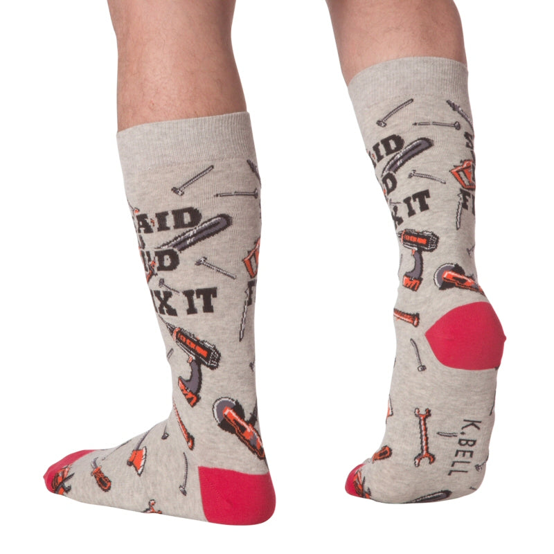 K Bell Mens Fix It Sock is being worn by a Model showing the side and back of the Sock. The words are Said I'd Fix It.