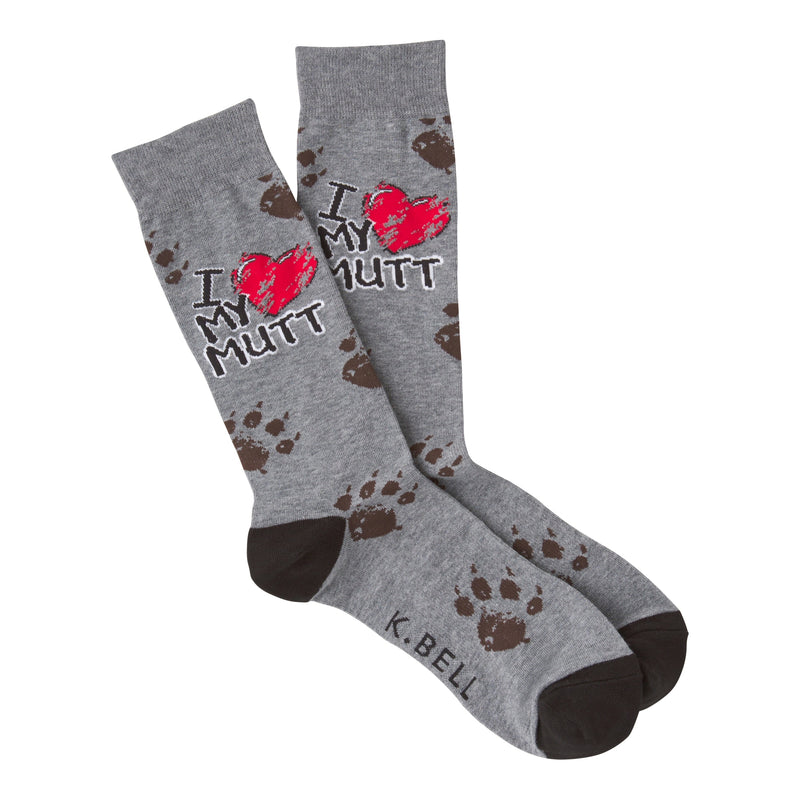 K Bell Mens I Luv My Mutt Sock is on a background of Charcoal Heather and has Black Heels and Toes. It has Taupe Paw Prints from top to bottom of the sock. Under the Cuff are words and Heart Reads, "I Luv My Mutt" Heart = Luv.